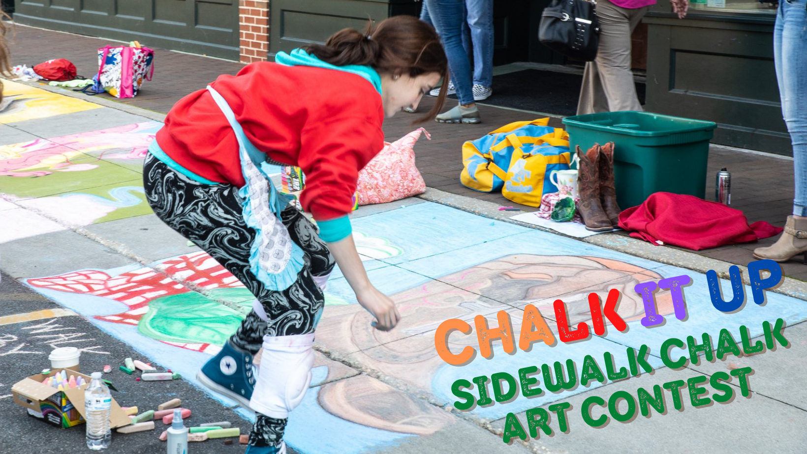 Woman drawing chalk art